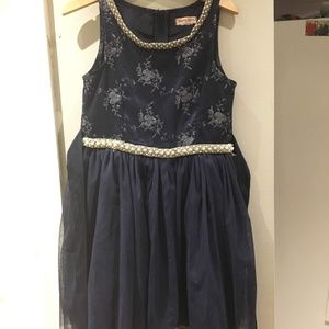 Navy special occasion dress by Nannette Lepore